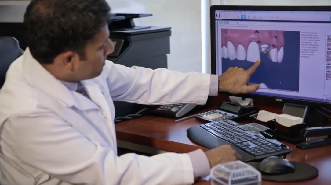 Dr. Pio Modi checking dental xray